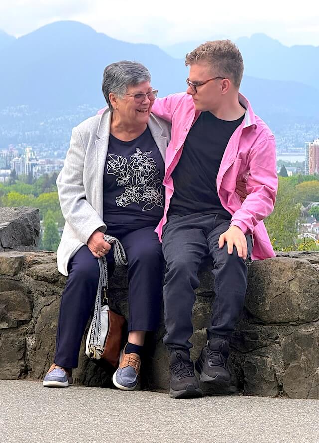Scott sitting with his Grandma.